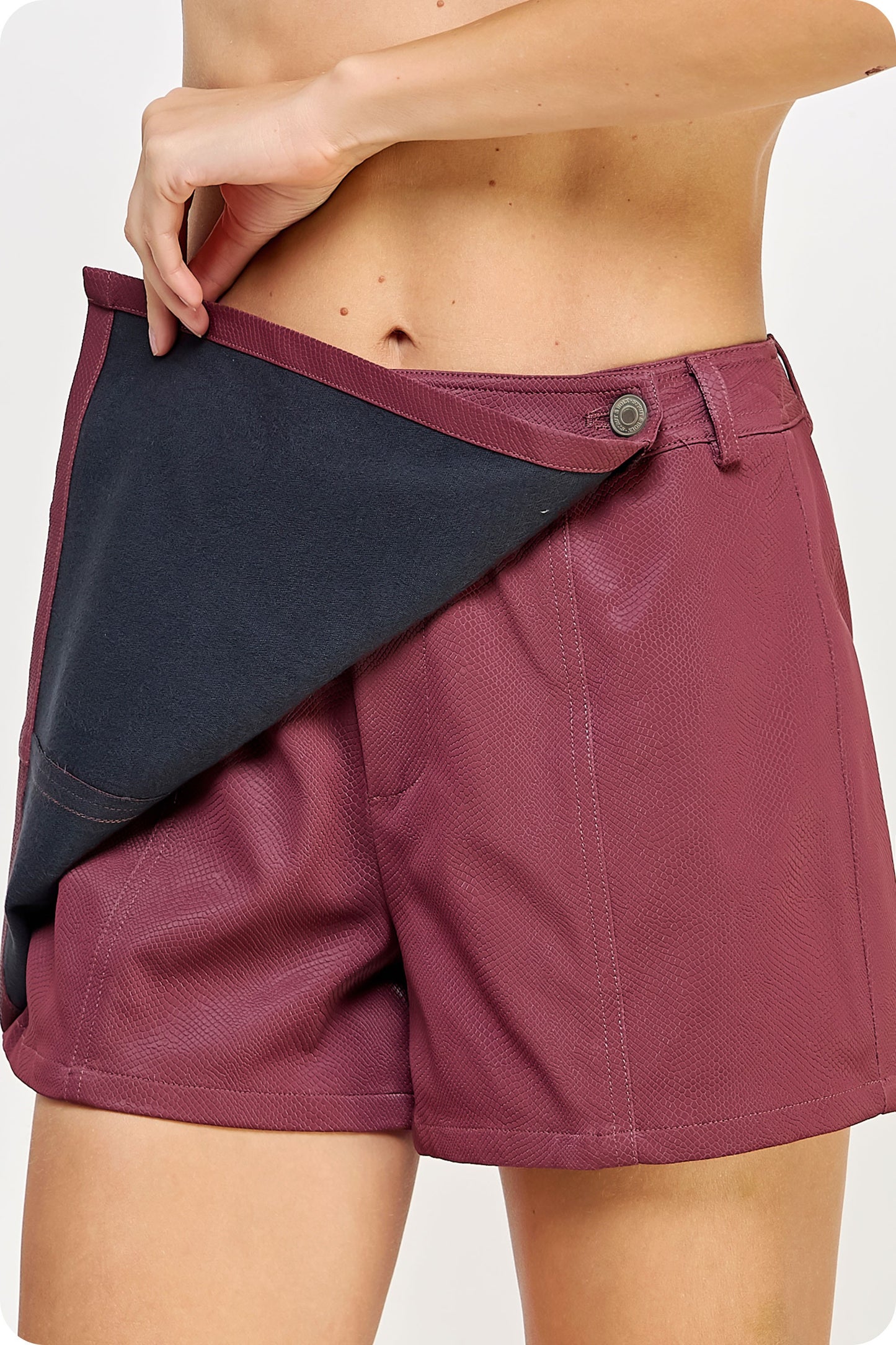 Snake Embossed Faux Leather Skort - Cabernet Burgundy. Front opening view.