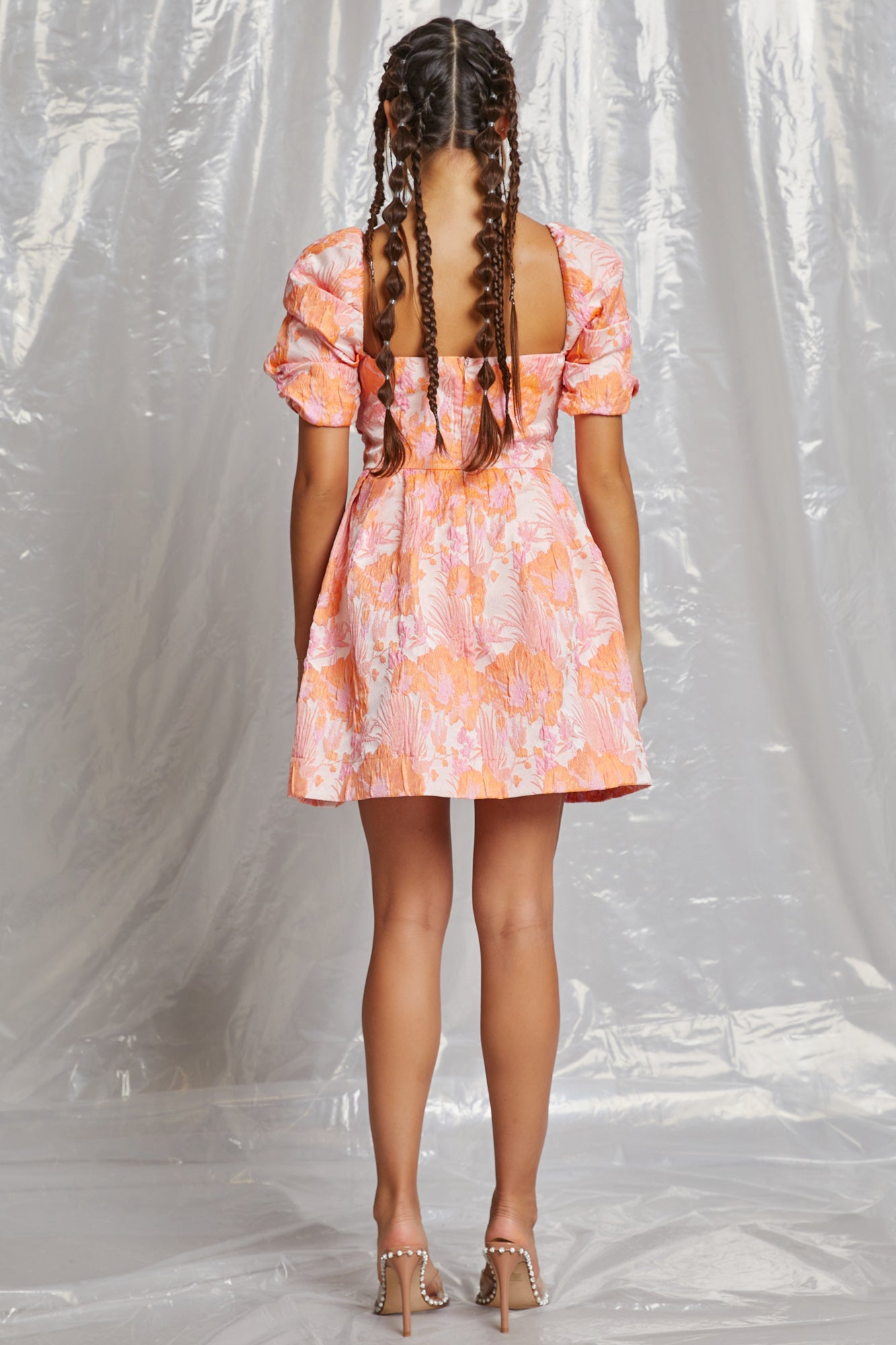 Puff Sleeve floral jacquard mini dress - orange & pink. Back full view.