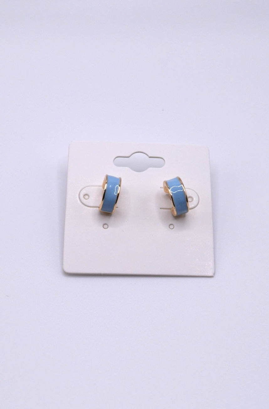 Turquoise hoops with gold outline and backing.