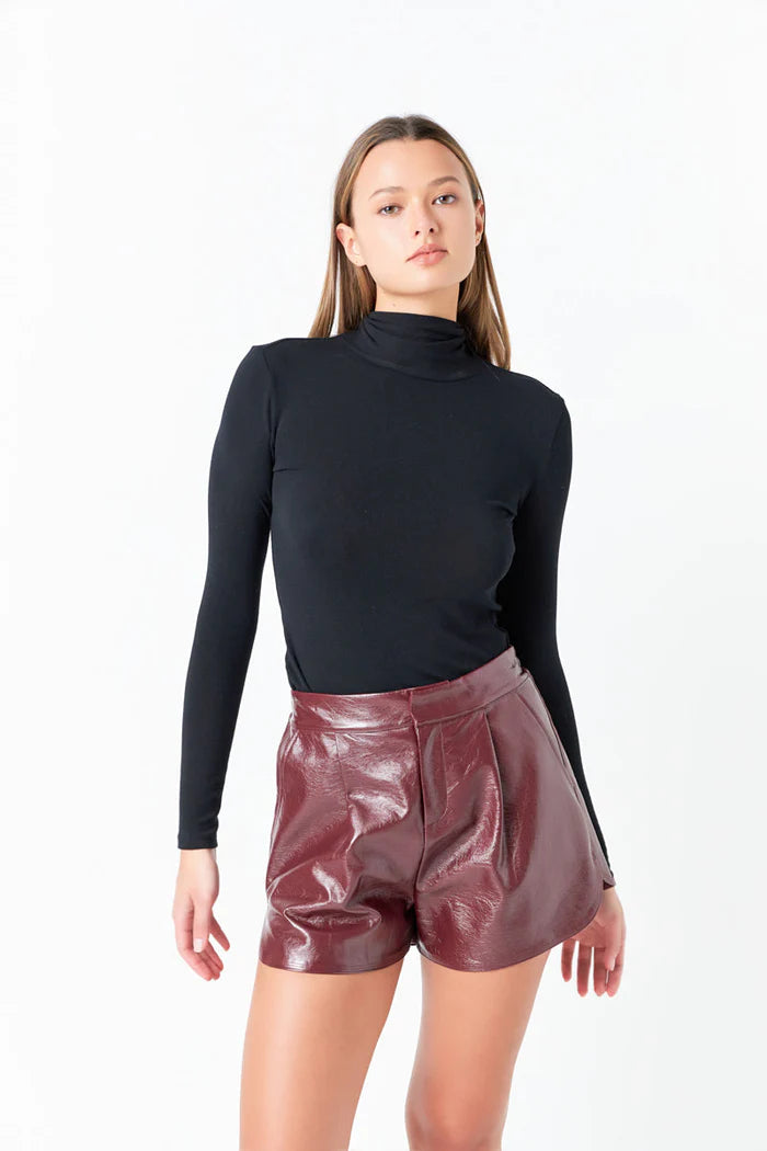 High-Waisted Faux Leather Shorts - Burgundy. Front view.