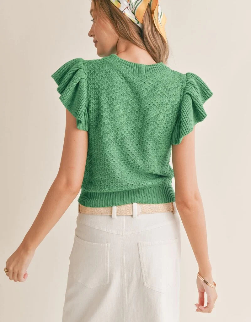 Crochet knit top featuring ruffle sleeves. Green. Back view.