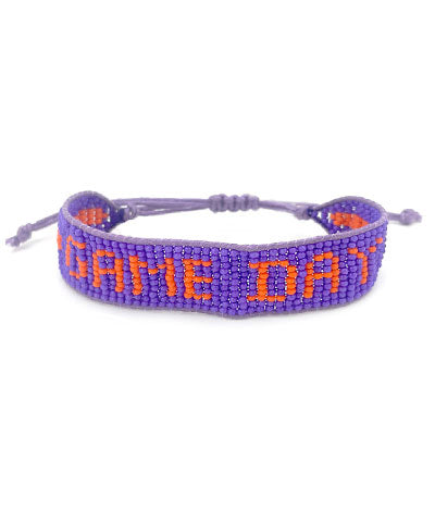 Purple beads with orange beaded "GAMEDAY". bracelet