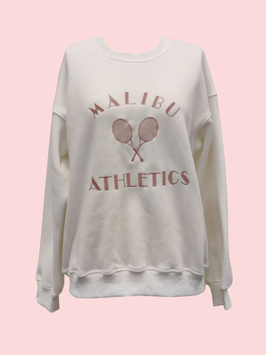 White oversized sweatshirt with "Malibu Athletics" and racquets embroidered on the front.