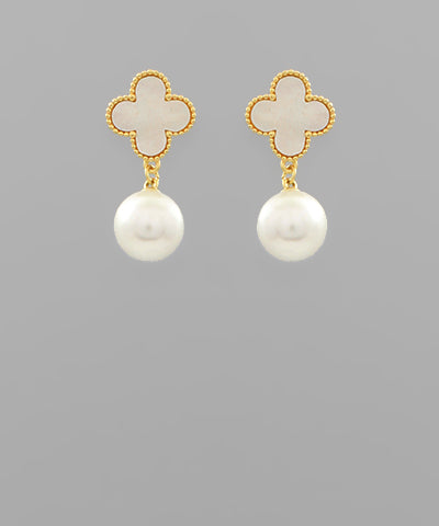 White & gold clover studs with pearl dangles. Measures 1in long.