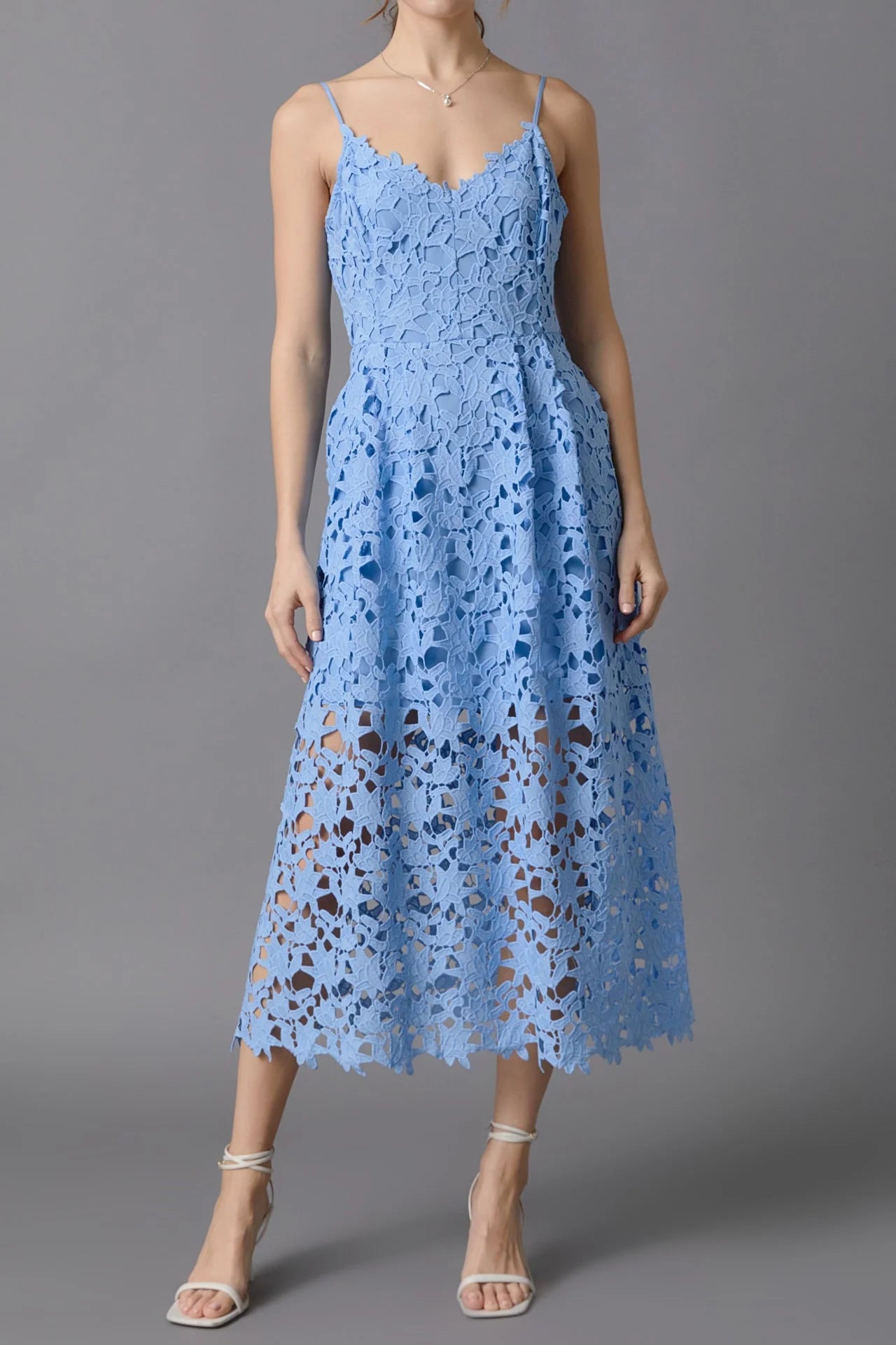 Lace overlay mini dress in powder blue. Front full view.