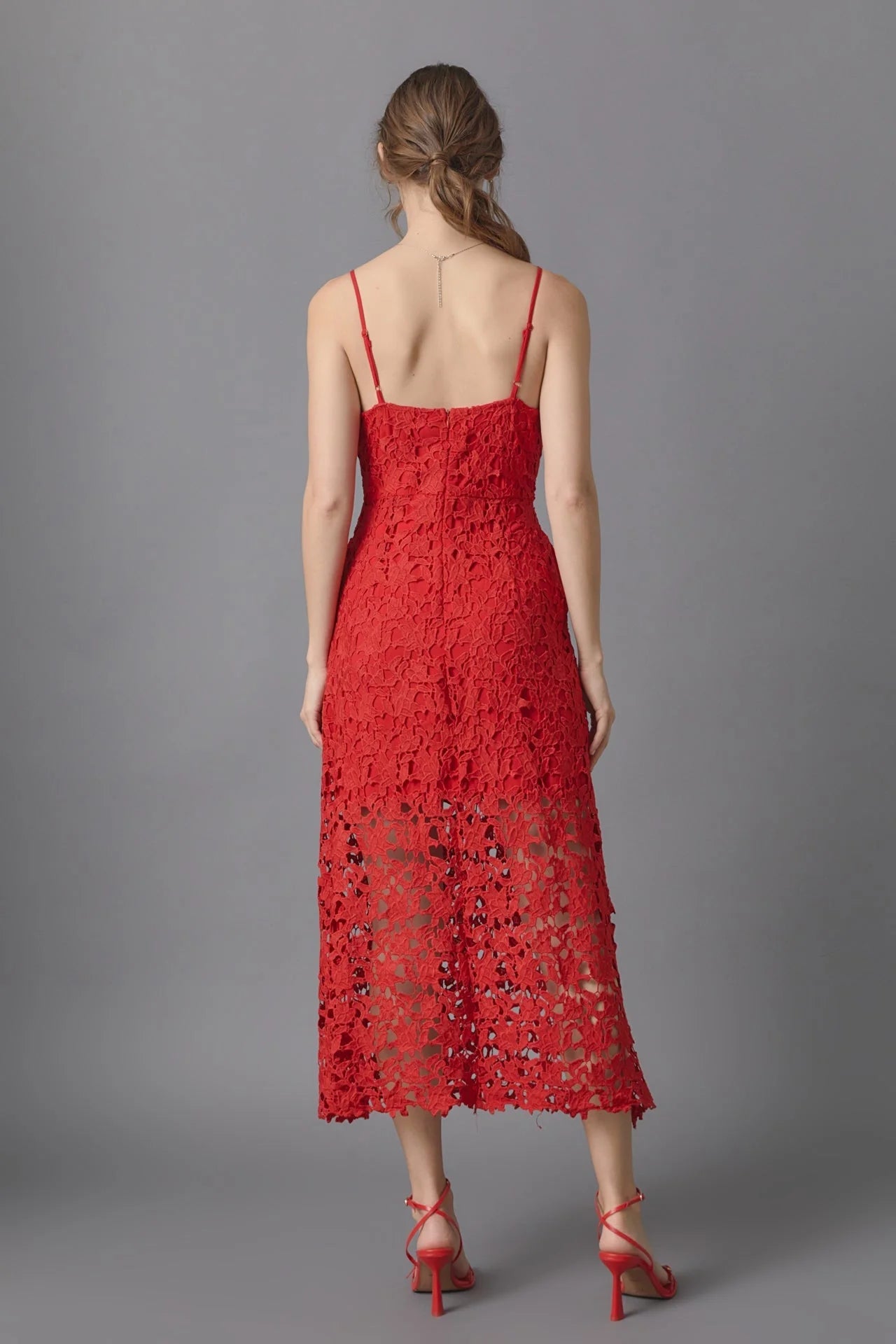 Lace overlay mini dress in red. Back full view.