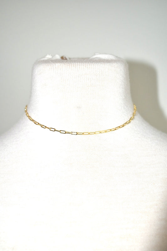 Chain link gold necklace measuring 12.5 in.