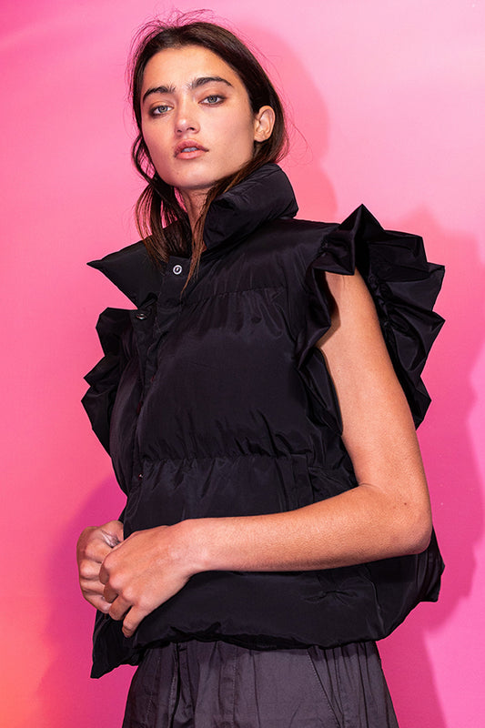 Ruffle sleeve crop down vest in black.  Front view.