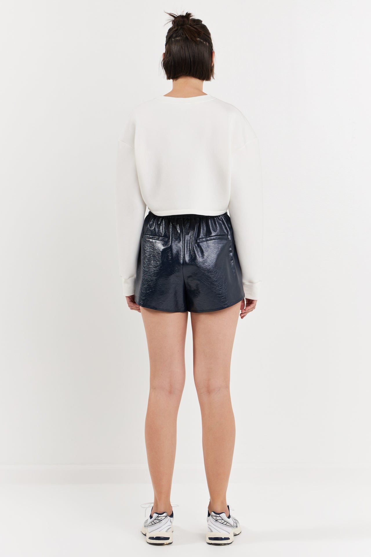 High-Waisted Faux Leather Shorts - Navy.  Back full view.