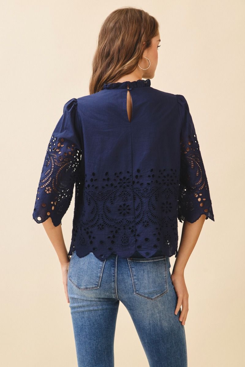 Floral eyelet embroidery 3/4 sleeve top.  Back view.