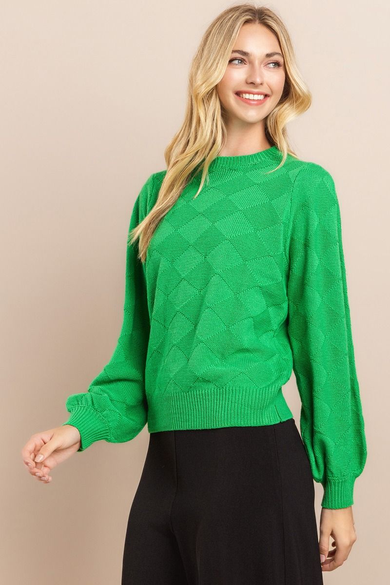 Oversized diamond textured long sleeve knit sweater with balloon sleeves.  Front view.