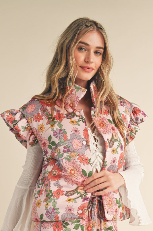 Floral Puffer Vest in Pink with flutter sleeves.  Front view.