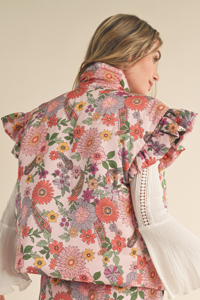 Floral Puffer Vest in Pink with flutter sleeves.  Back view.