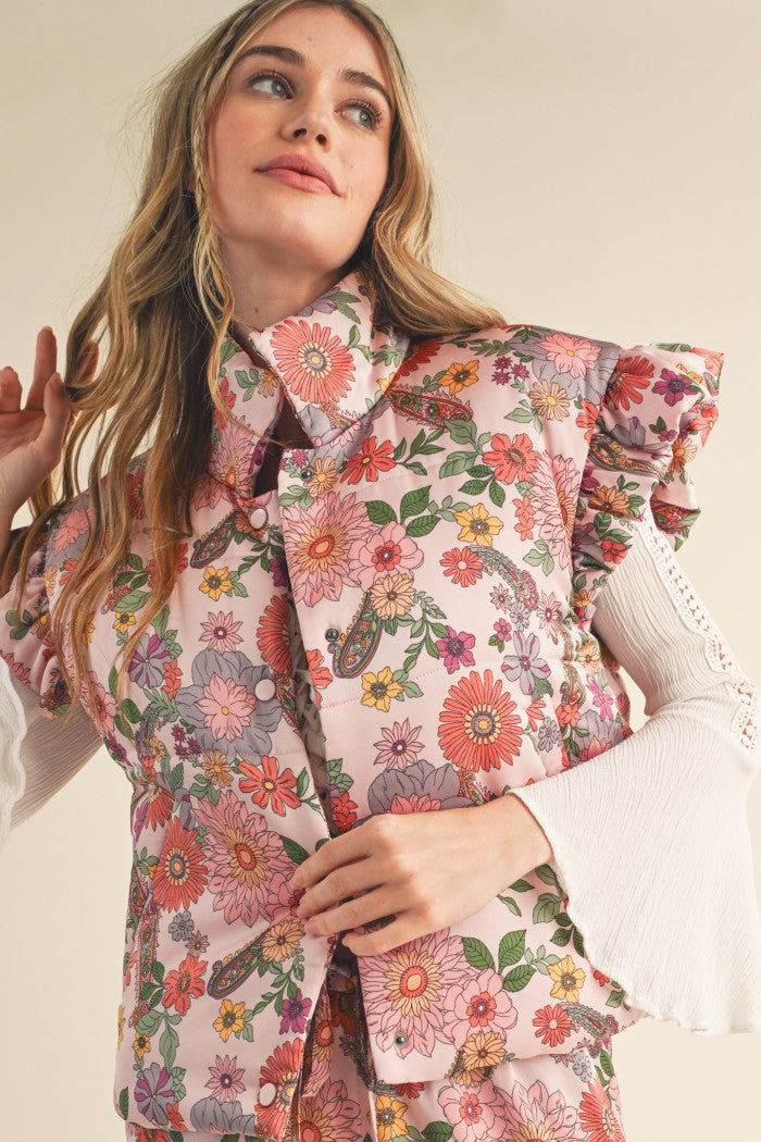 Floral Puffer Vest in Pink with flutter sleeves.  Front view.