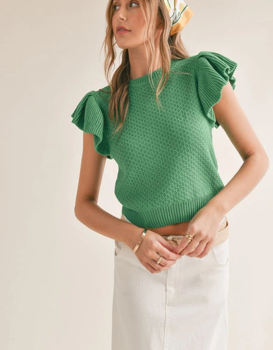 Crochet knit top featuring ruffle sleeves.  Green.  Front view.